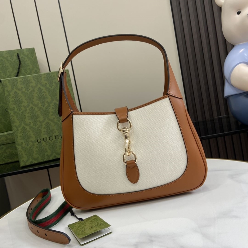 G*u*i top handle bags